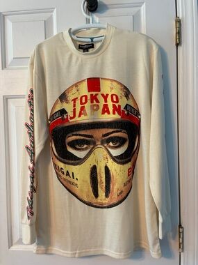 Oversized Cream Long-Sleeve T-shirt with Red and Black Helmet Graphic